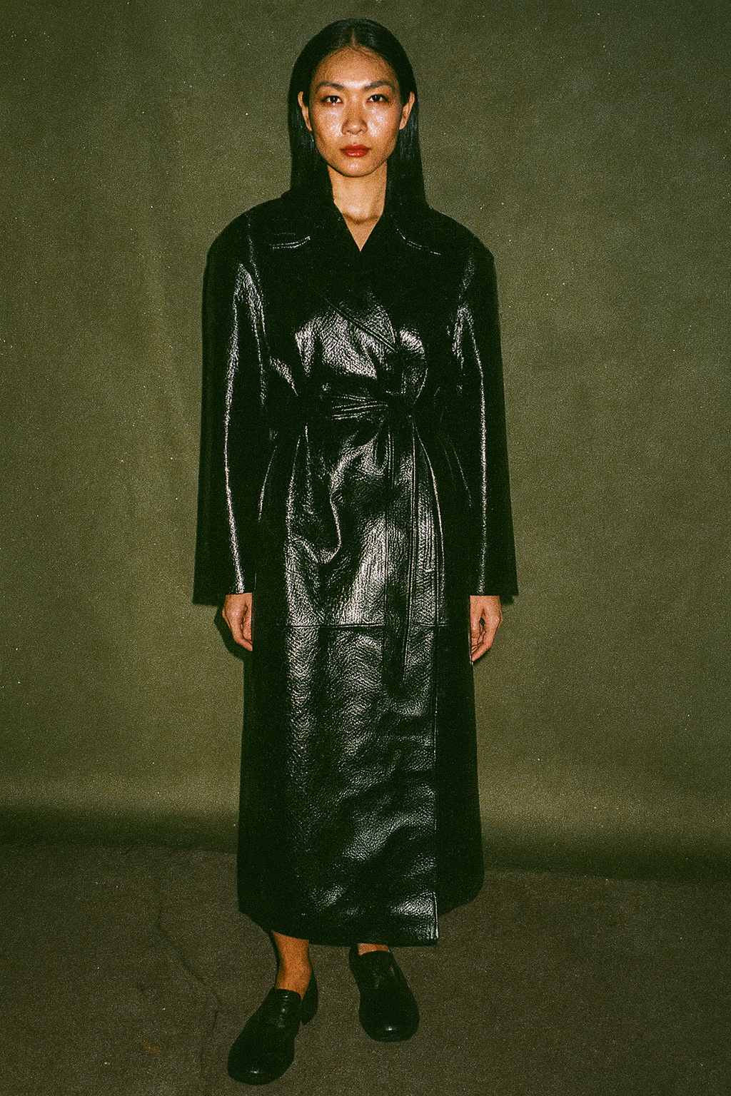 The Frankie Shop Leather Coat with Glossy Large Button Self Tie Belt at the Waist Two Pocket