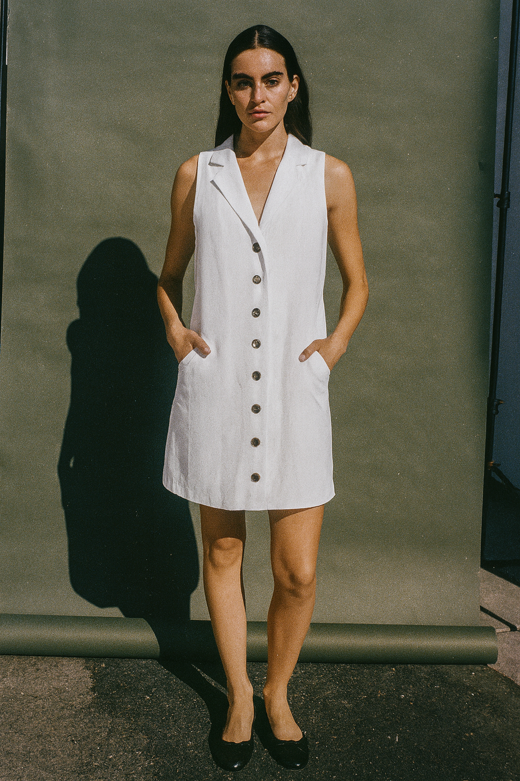 White Vest with Brown Botton