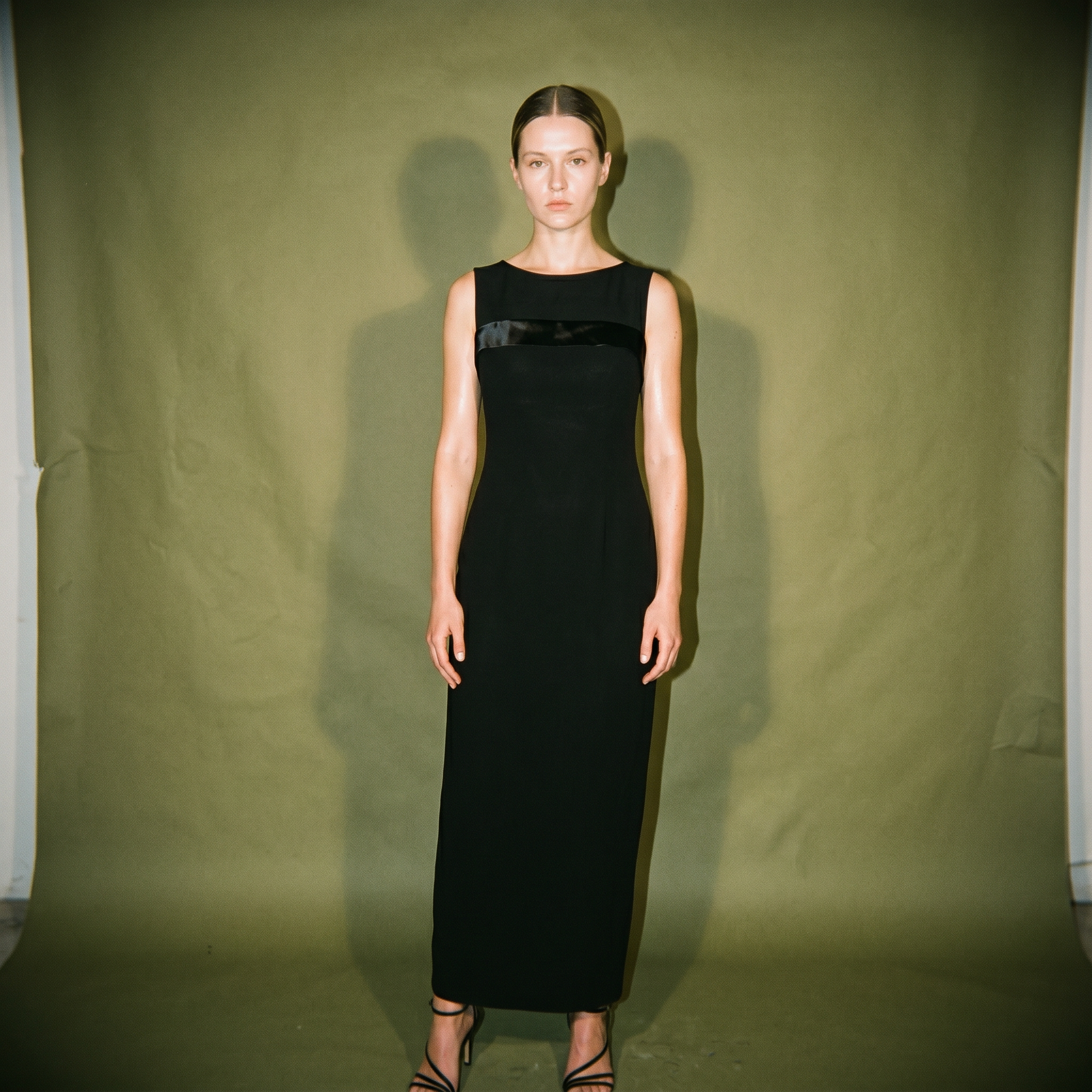 Cignal Black Dress Sleeveless Sheer Neckline Bow at the Bust Slit