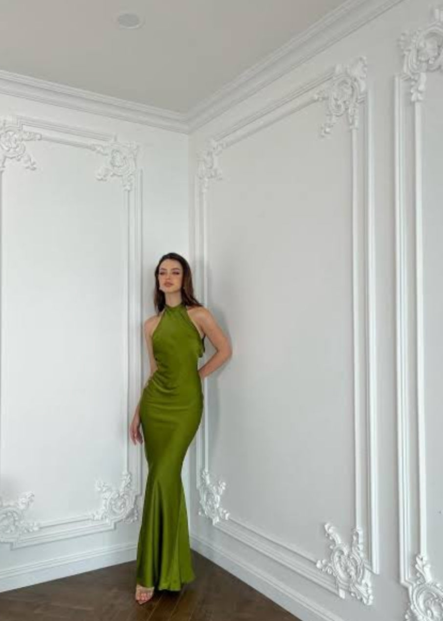 Kisserine Halter Neckline Fitted Bodice That Accentuates Waist and Hips Silk